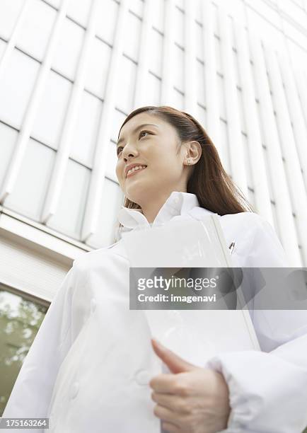woman doctor - biomedical animation stock pictures, royalty-free photos & images