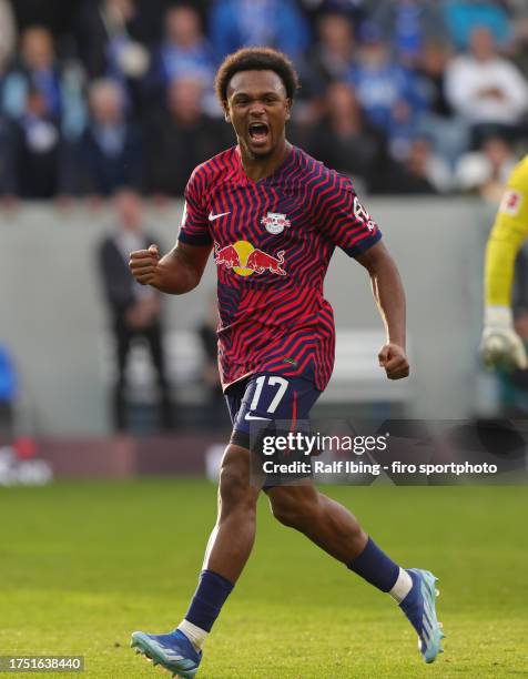 Lois Openda of RB Leipzig celebrates after scoring his teams third goal during the Bundesliga match between SV Darmstadt 98 and RB Leipzig at...