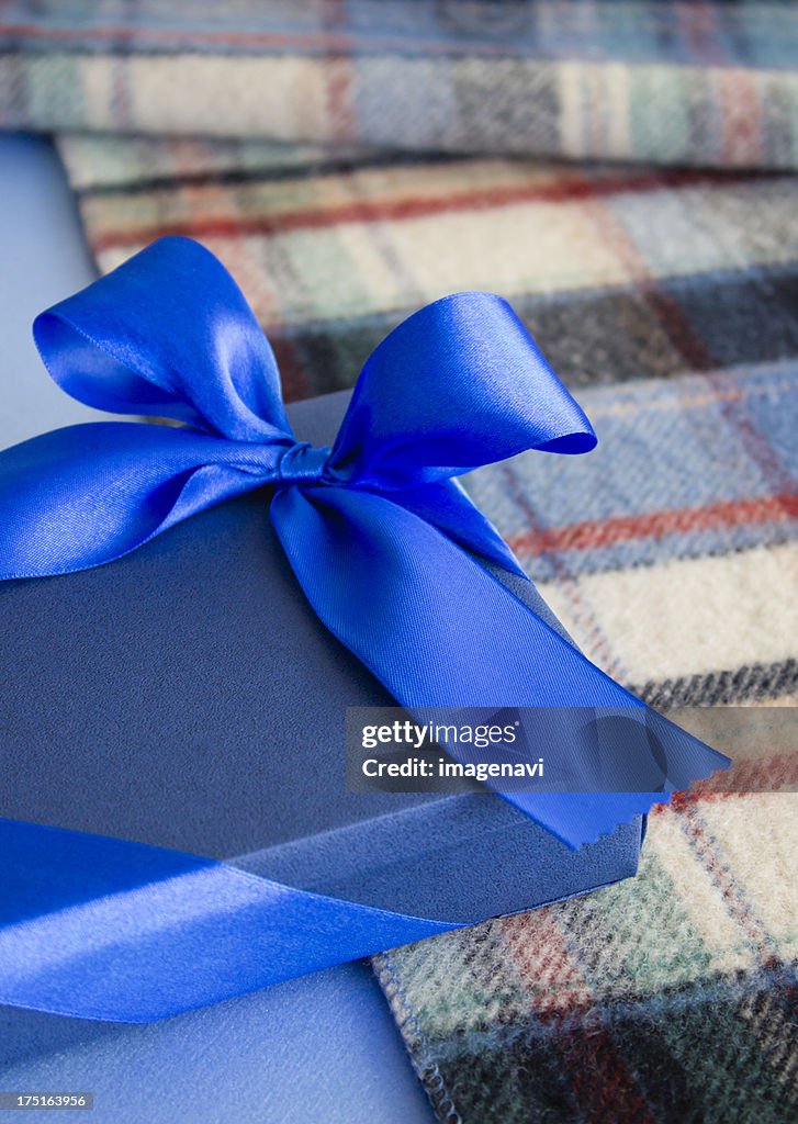 Check stole and a blue gift box