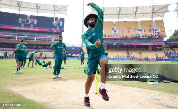 Shadab Khan of Pakistan warms up ahead of the ICC Men's Cricket World Cup India 2023 between Pakistan and Afghanistan at MA Chidambaram Stadium on...