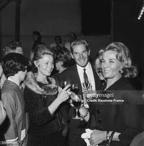 Dany Robin et Georges Marchal au cocktail de réouverture du théâtre de l'Oeuvre, le 17 juin 1960.