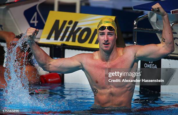 James Magnussen of Australia celebrates winning the Swimming Men's Freestyle 100m Final on day thirteen of the 15th FINA World Championships at Palau...