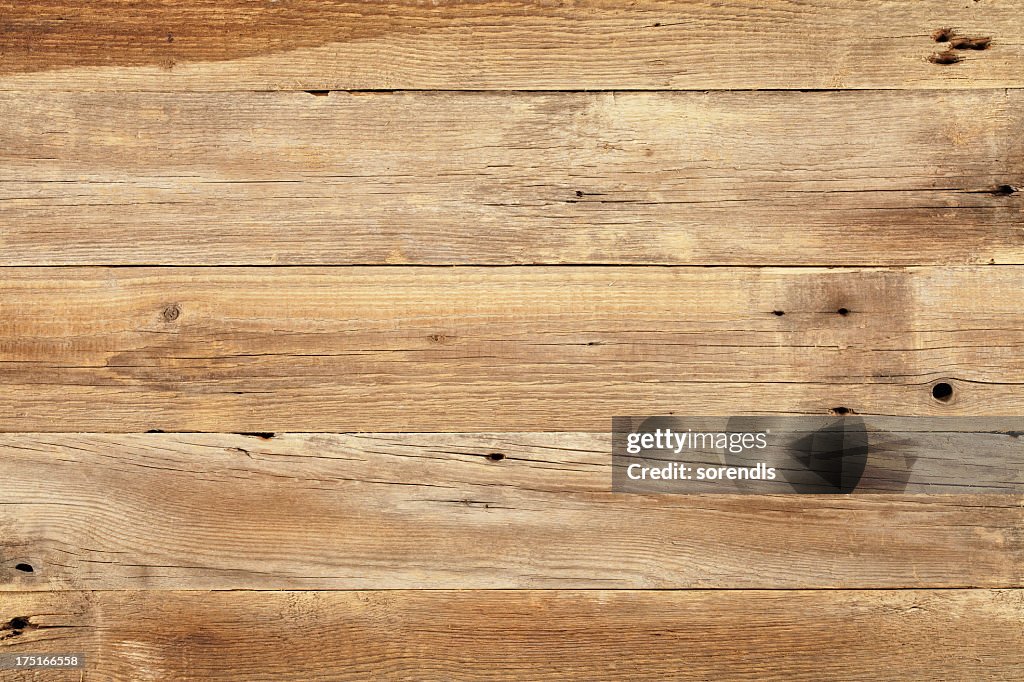 Close view of wooden plank table