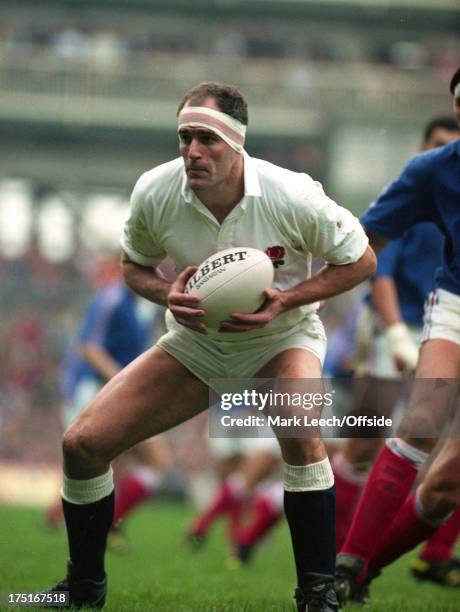 March 1991 - 5 Nations Rugby - England v France - England lock forward Paul Ackford gathers the ball.