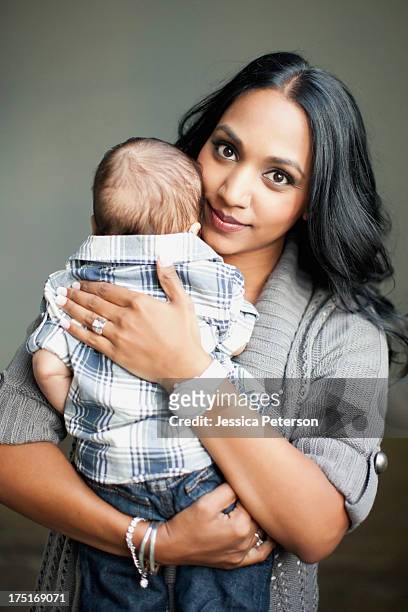 mother holding her son (2-5 months) - indian baby boy stock pictures, royalty-free photos & images
