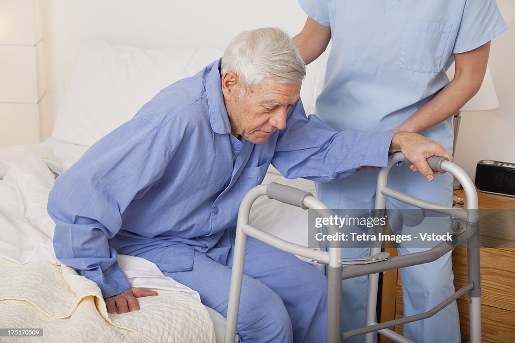 Nurse helping a senior patient