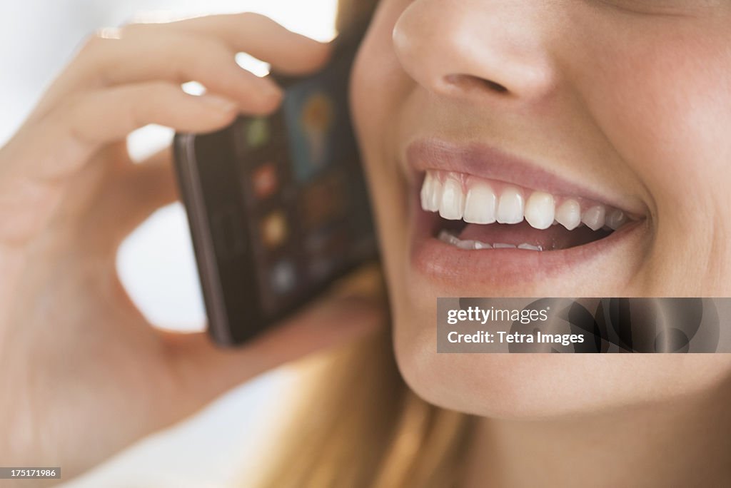 Close-up of woman talking on phone