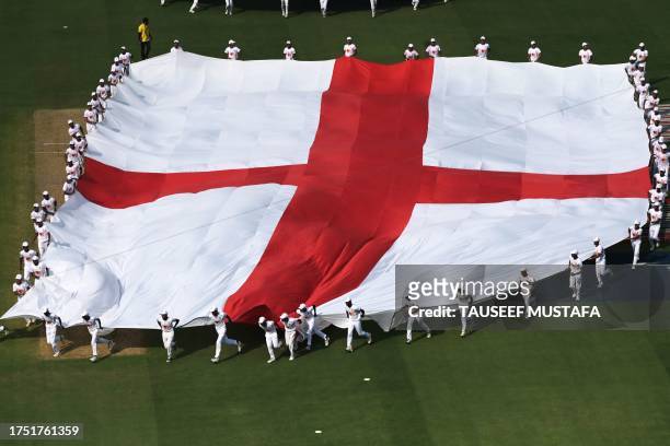 The national flag of England is displayed before the start of the 2023 ICC Men's Cricket World Cup one-day international match between India and...