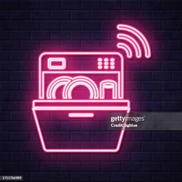 smart dishwasher. glowing neon icon on brick wall background - cleaning electronics stock illustrations