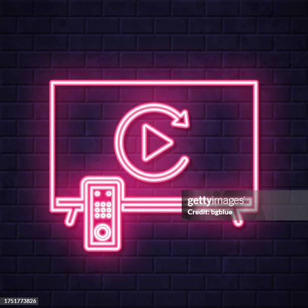 replay on tv. glowing neon icon on brick wall background - replay stock illustrations