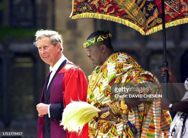 Prince of Wales walks in the Honounary Graduands procession at the University of Glasgow with HM Otumfuo Osee Tutu II from Ghana, 21 June 2001. The...