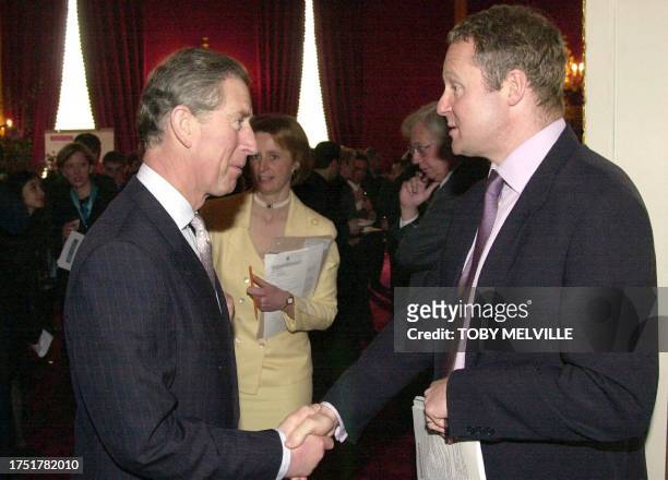 The Prince of Wales meets British impressionist Rory Bremner at an awards ceremony for Business Action on Homelessness 27 March 2002, at St. James' s...