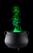 For Halloween, Witches Cauldron with Green Smoke, on Black.