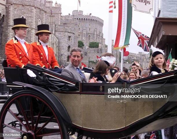 The carriage carrying HRH Prince Charles follows in the procession of the newly-wed royal couple HRH Prince Edward and Sophie Rhys-Jones as they make...