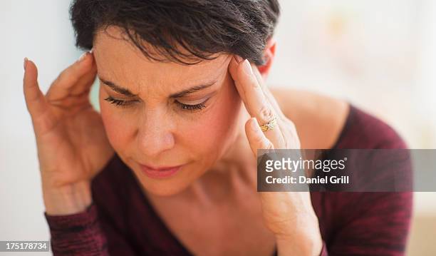 usa, new jersey, jersey city, portrait of mature woman with hands on head - muster stock pictures, royalty-free photos & images