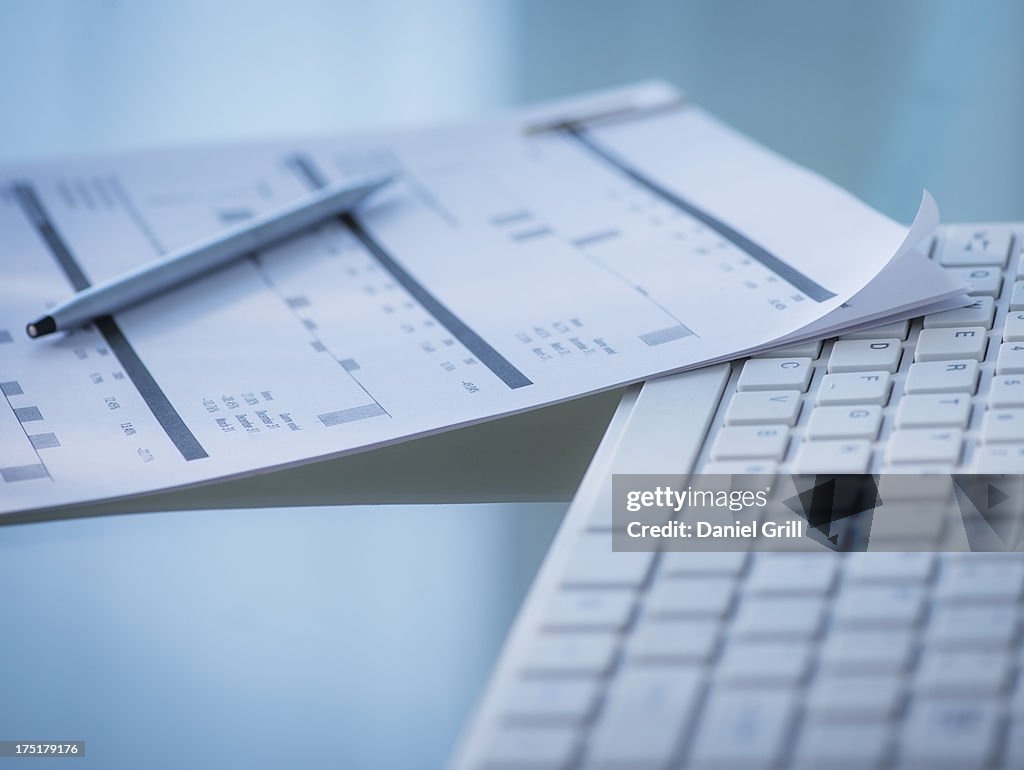 Studio Shot of calculator and paper material