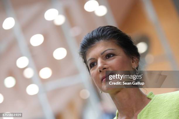 Leftist politician Sahra Wagenknecht prepares to depart after presenting her BSW political alliance to the media on October 23, 2023 in Berlin,...