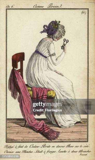 Fashionable woman seen at Cafe Frascati, 1798. She wears a casual hat decorated with lace and a rose on one side. She wears a sleeveless chemise,...
