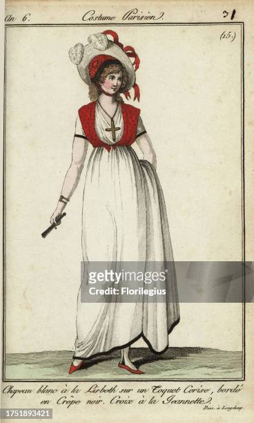 Woman in a Lisbeth hat in the fashion of 1798. Her white Lisbeth-style hat is worn above a cherry-red cap edged in black crepe. Her peasant-style...