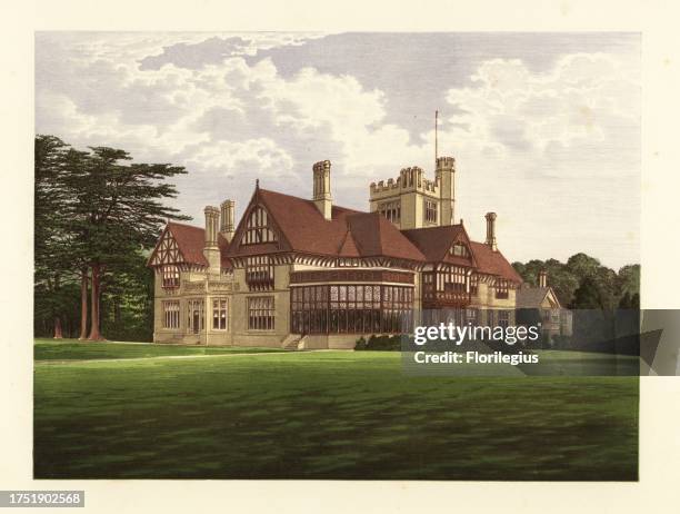 Cowdray Park, Sussex, England. Tudor-style house with castellated turret, half-timber frame and gables, built in the 19th century. Home of Charles...