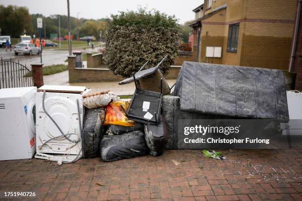 Residents begin the clean and count the costs as flood waters recede in the village of Catcliffe after Storm Babet flooded home, business and roads...