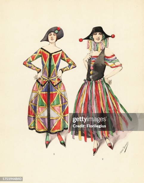 Women in checkered and motley fancy dress costumes as Harlequin from the commedia dell'arte. Woman in blue, red and green satin outfit edged in black...