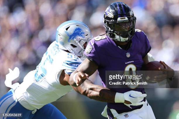 Quarterback Lamar Jackson of the Baltimore Ravens rushes with the ball against the Detroit Lions at M&T Bank Stadium on October 22, 2023 in...