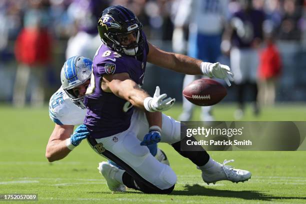 Mark Andrews of the Baltimore Ravens attempts to catch a pass in front of linebacker Jack Campbell of the Detroit Lions during the second quarter at...