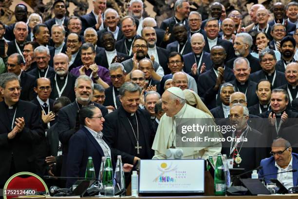 Pope Francis poses with participants to the XVI Ordinary General Assembly of the Synod of Bishops at the Paul VI Hall on October 23, 2023 in Vatican...