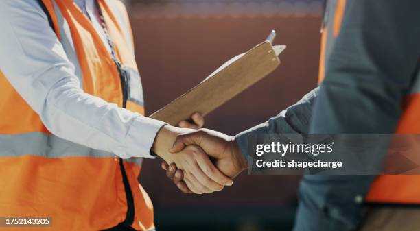 engineering people, shaking hands and warehouse introduction, welcome or meeting for inspection with checklist. project manager handshake for teamwork, industry meeting or deal at shipping container - civil engineering stock pictures, royalty-free photos & images