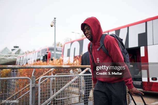 Alphonso Davies of FC Bayern Muenchen arrives at the airport to travel for upcoming Champions League match, on October 23, 2023 in Munich, Germany.