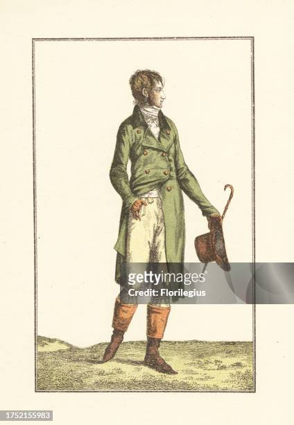 Men's fashion during the French Revolutionary era, Paris, 1799. He wears a large green double-breasted riding coat, trousers tied under the knee,...