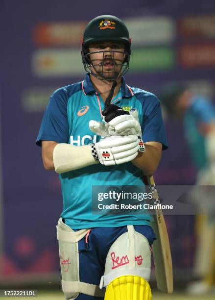 Travis Head of Australia looks on during an Australian training session at the ICC Men's Cricket World Cup India 2023 at the Arun Jaitley Stadium on...