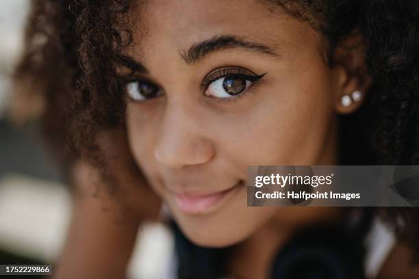 portrait of a beautiful african-american teenage girl. close beauty shot with copy space. - girl using tampon ストックフォトと画像