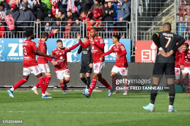 Brest's Beninese forward Steve Mounie celebrates scoring his team's first goal during the French L1 football match between Stade Brestois 29 and...