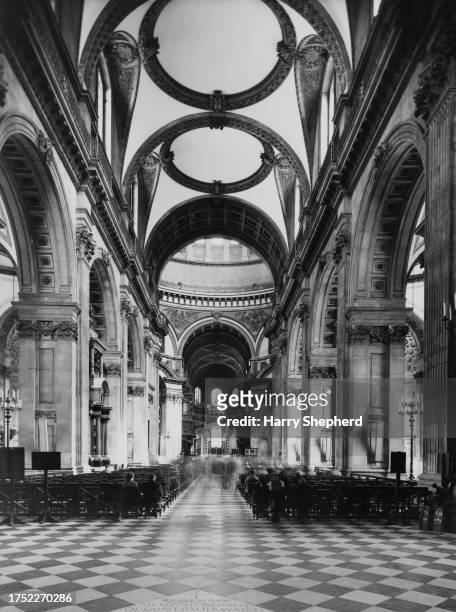 An interior view looking east along the nave of St Paul's Cathedral on Ludgate Hill, in the City of London, England, May 1962. The English Baroque...