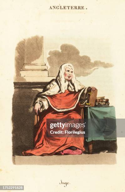 Judge in wig and robes worn on the bench, 1800s. With legal books, desk and foot cushion. Juge. Handcoloured copperplate engraving after an...