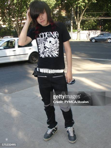 An Emo boy poses with his hand on his head, Santiago, Chile 2007.