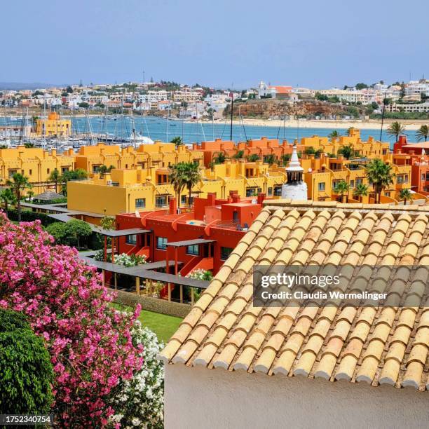 colourful houses in portimão - faro city portugal stock-fotos und bilder