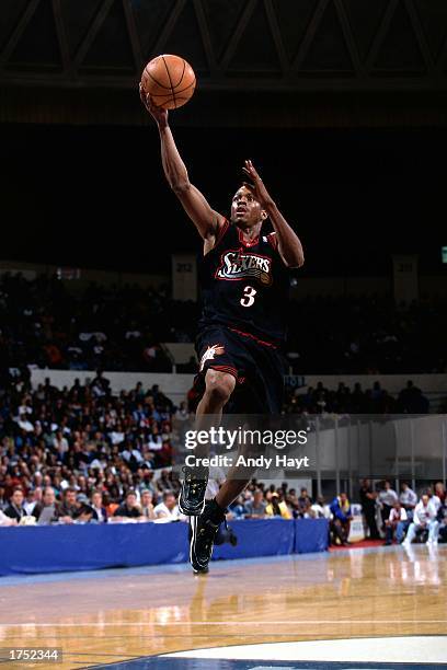 Allen Iverson of the Philadelphia 76ers drives to the basket for a layup during an NBA game. NOTE TO USER: User expressly acknowledges and agrees...