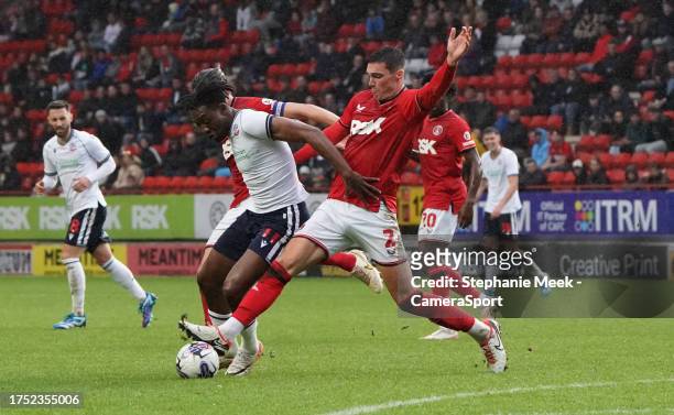 Bolton Wanderers' Dan Nlundulu battles with Charlton Athletic's Lloyd Jones during the Sky Bet League One match between Charlton Athletic and Bolton...