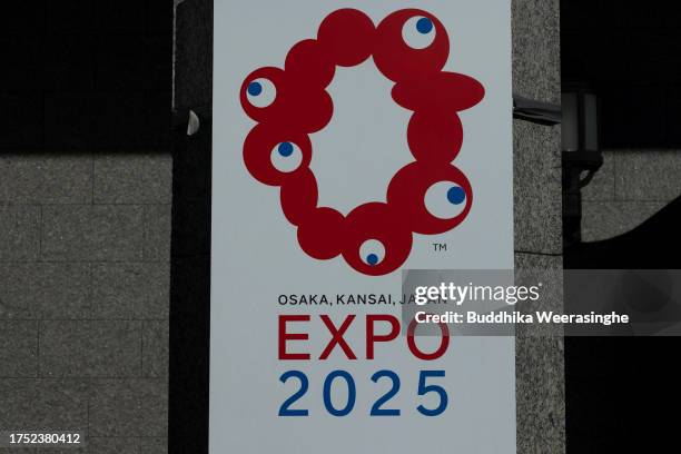 The logo of the Osaka Expo 2025 exhibits outside the Osaka city office on October 23, 2023 in Osaka, Japan. The cost of building the Osaka Expo 2025...