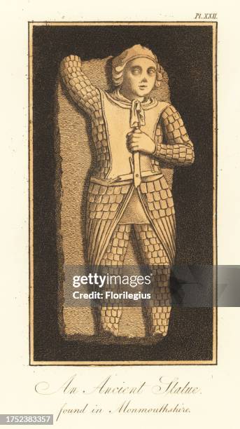 Saxon figure of St Michael in suit of gilt scale armour, 9th century. Originally holding a sword and scales, weighing a human head against the world....