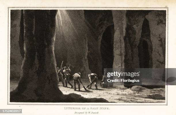 Workers using pick axes and baskets to mine rock salt in mines in Northwich, Cheshire. Opened in 1670, the lrage cavity was created with gunpowder,...