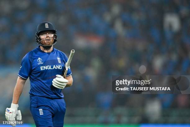 England's Jonny Bairstow walks back to the pavilion after his dismissal during the 2023 ICC Men's Cricket World Cup one-day international match...