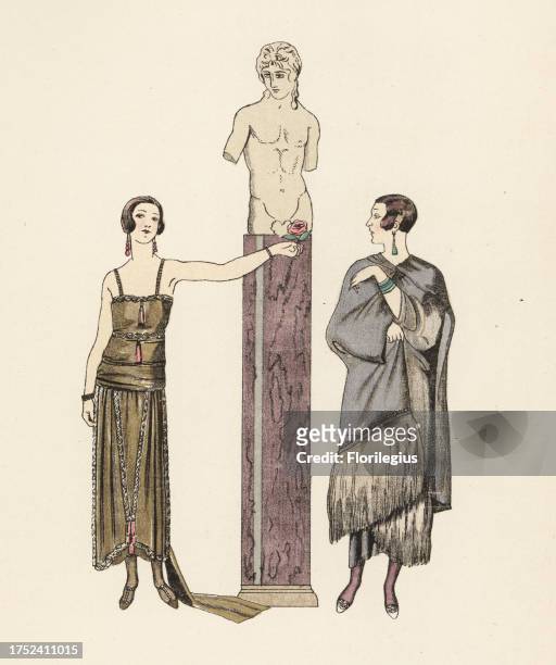 Women in short bob haircuts in evening gown and coat by the couture designer Worth, offering a rose to a statue of Eros. Robe et manteau du soir par...