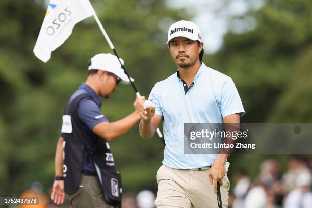 Satoshi Kodaira of Japan acknowledges the gallery on the 9th green during the final round of ZOZO Championship at Accordia Golf Narashino Country...