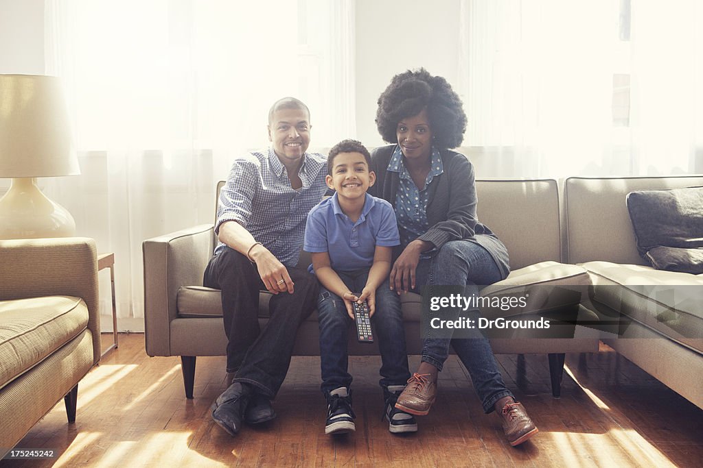 Happy family in living room together