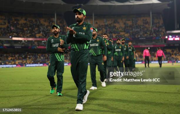 Babar Azam of Pakistan leads their side off following defeat by 8 wickets following the ICC Men's Cricket World Cup India 2023 between Pakistan and...