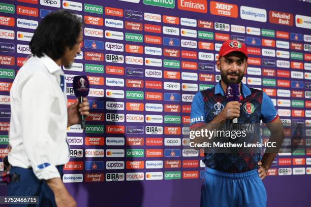 Hashmatullah Shahidi of Afghanistan looks on as they are interviewed by Ramiz Raja ahead of the ICC Men's Cricket World Cup India 2023 between...